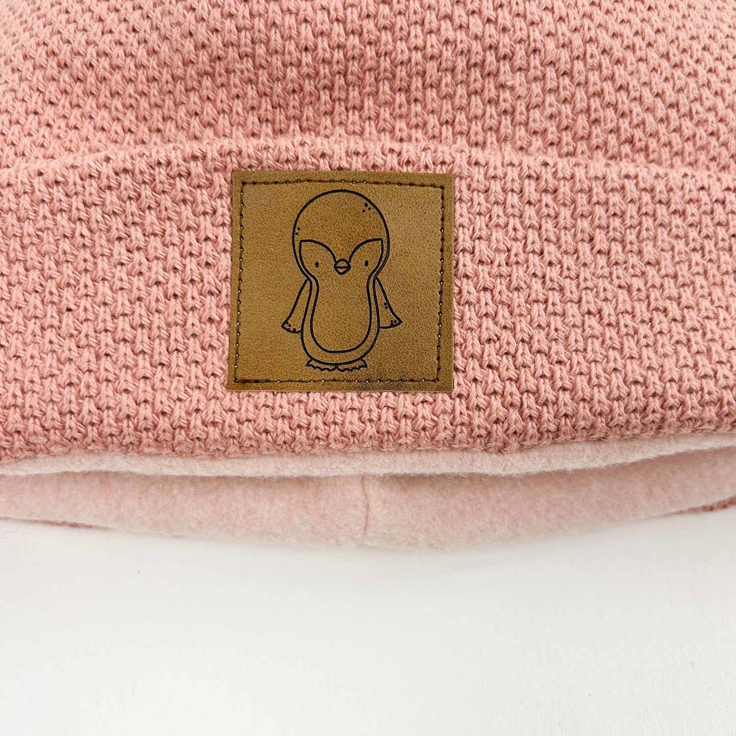 Grobstrick Mütze Rosa mit Label Pinguin - BIO Baumwollfleece