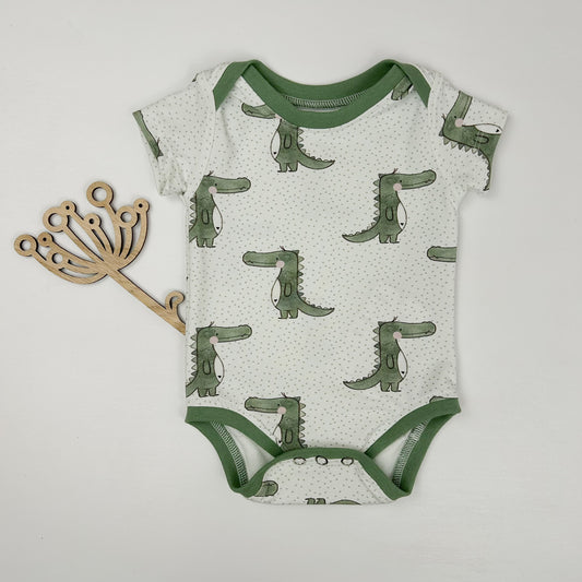 Kleiner Crocofreund – Babybody mit niedlichem Krokodil-Print