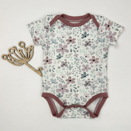 Blütenzauber – Babybody für kleine Frühlingskinder
