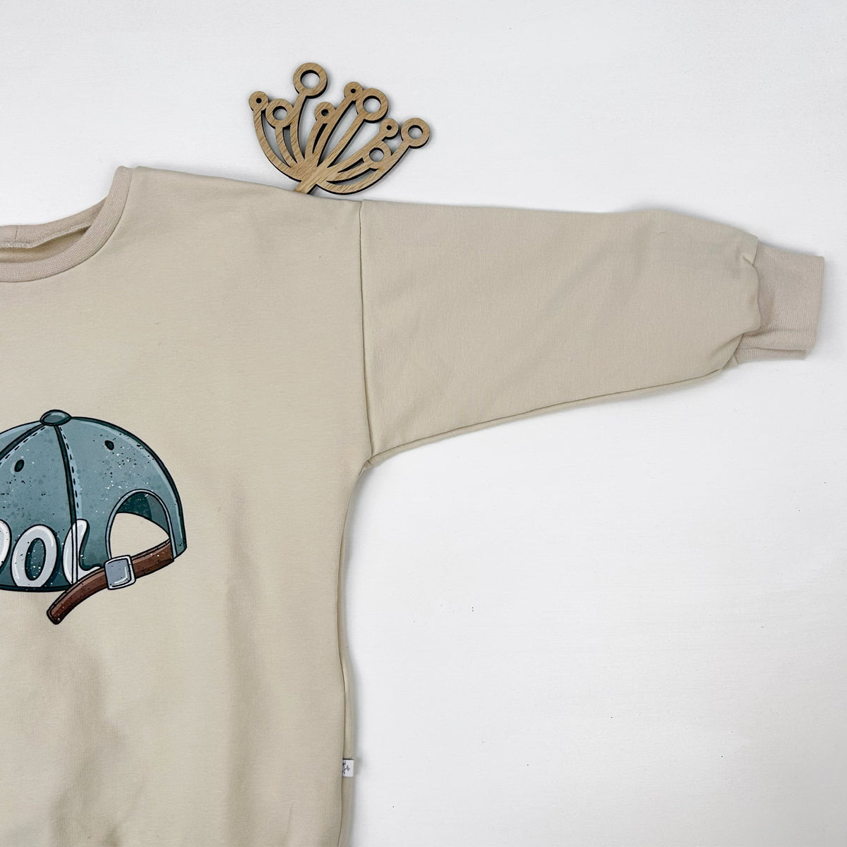 Kinder Oversize-Pullover mit Cap-Print aus Baumwolle – Creme
