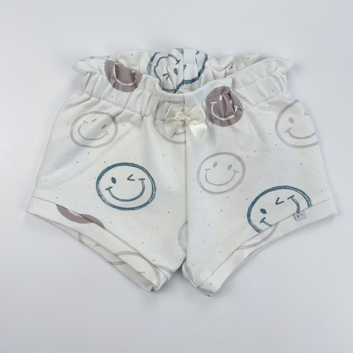 Smiley – Fröhliche Babyshorts aus Bio-Baumwolle